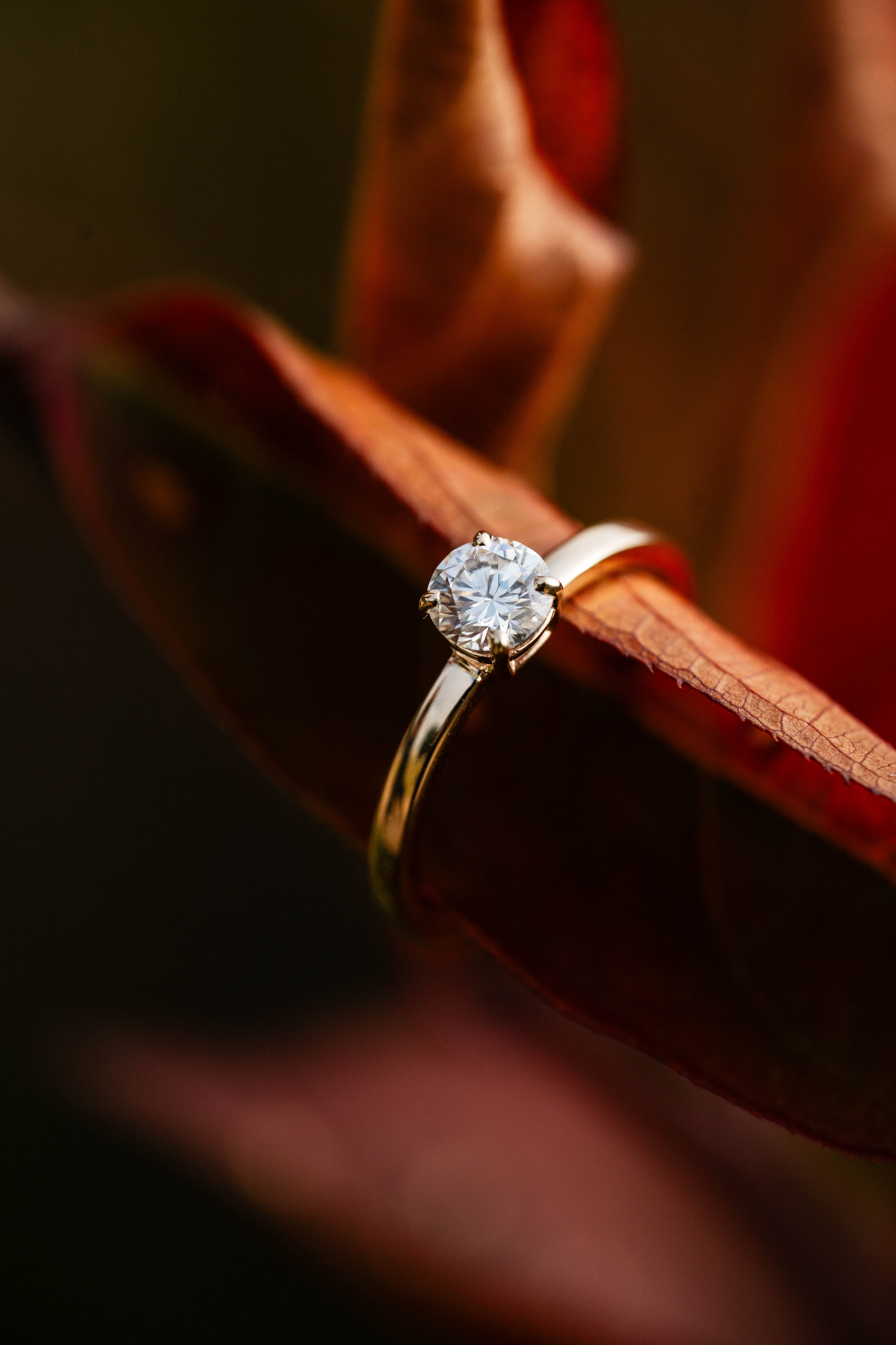 yellow gold and diamond solitaire engagement ring